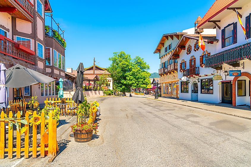 The picturesque Bavarian-themed town of Leavenworth, Washington, in summer, with picturesque European-style shops and cafes in the Cascade Mountains