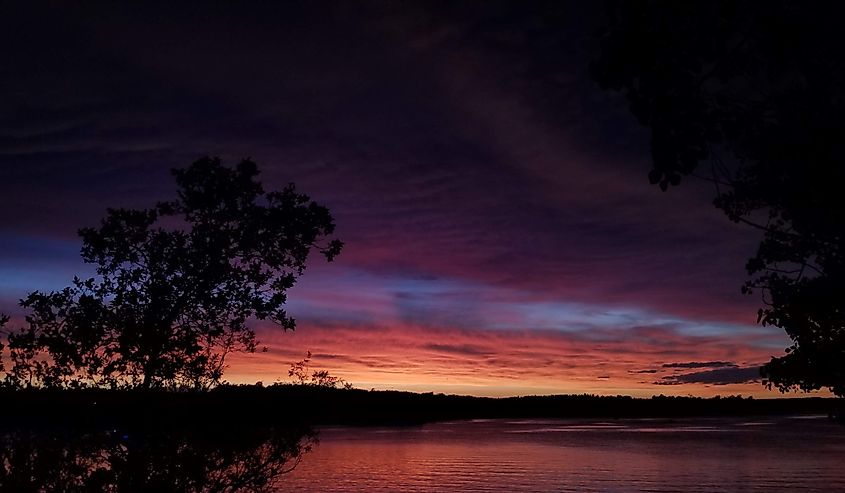 Dark and vibrant sunset at Lake Metigoshe, ND