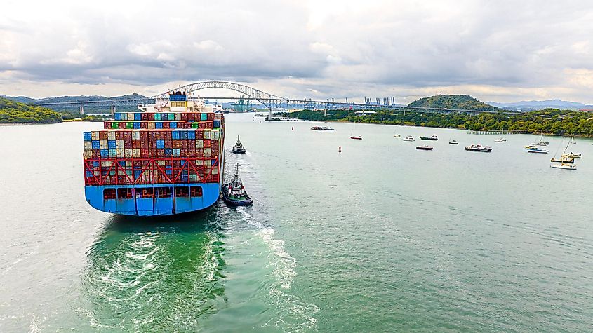 A cargo ship going through the Panama Canal, Panama. Source: Shutterstock/Jose Mario Espinoza