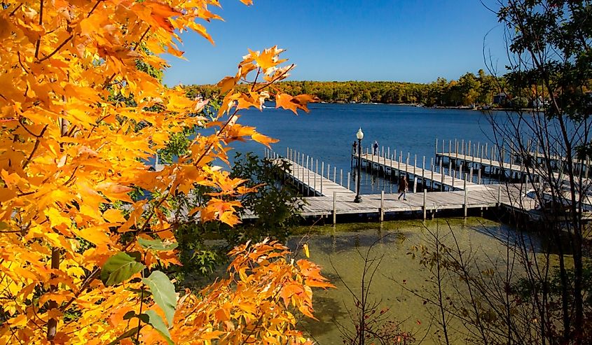 Boat dock along the shore of Paugus Bay on Lake Winnipesaukee, near Laconia, New Hampshire.