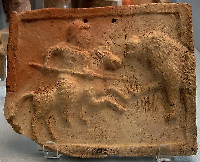 Parthian cataphract fighting a lion.