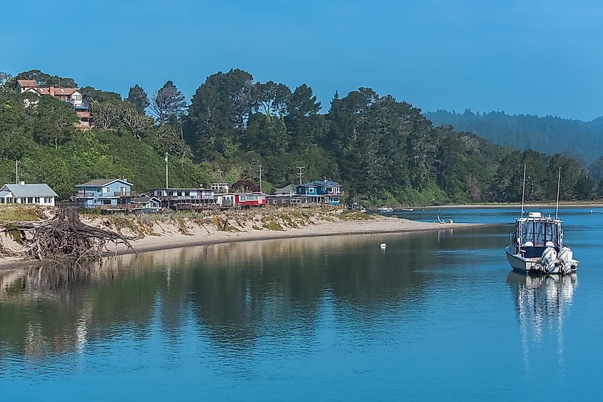 The village of Bolinas on the Pacific coast in California, featuring charming homes and scenic views of the ocean and surrounding landscape.