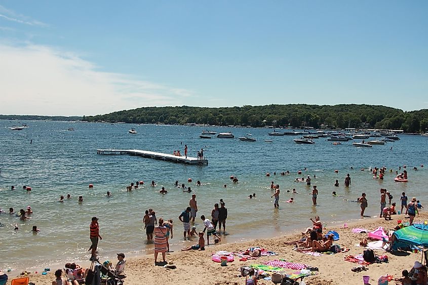 People rest on the beach Lake Geneva in Wisconsin