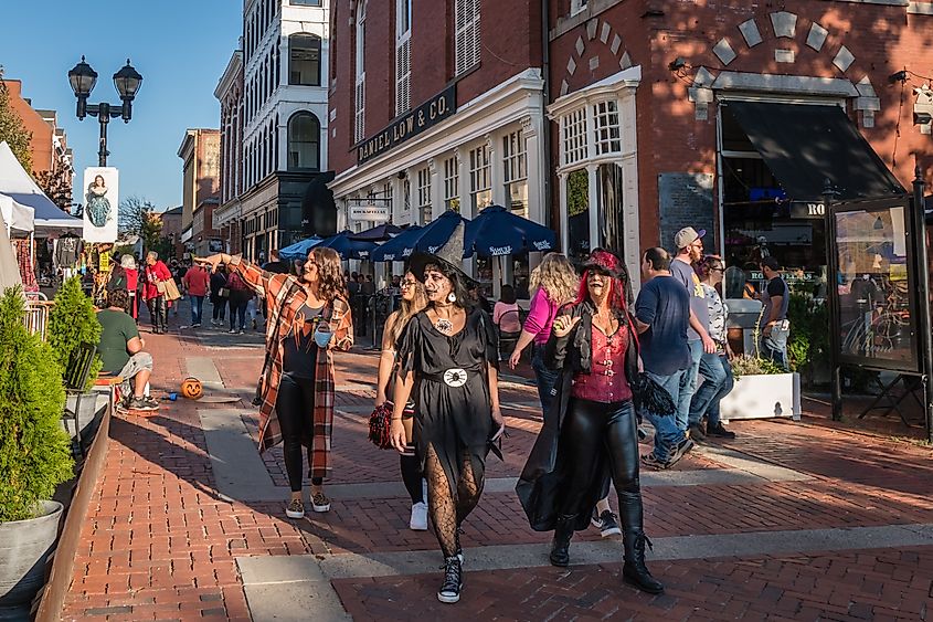 People in costumes at Salem's annual Haunted Happenings event, celebrating the town's witch trials history and Halloween