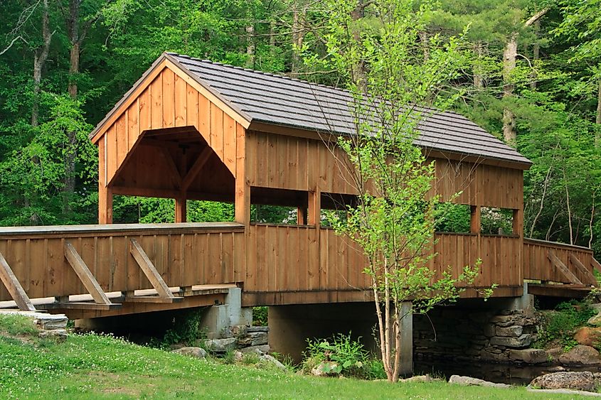Wooden covered bridge at Devil's Hopyard State Park in Connecticut on a summer afternoon