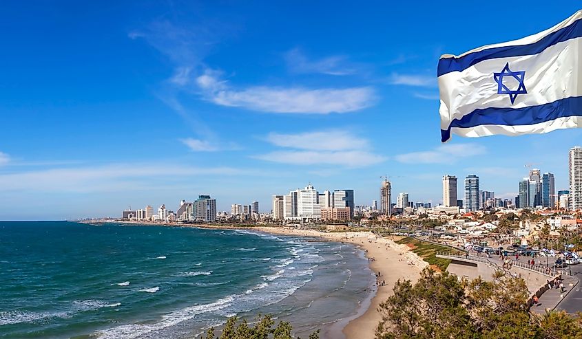 Israeli National waving flag on Tel Aviv coast