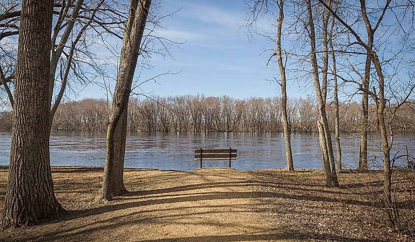 A bench in In Otsego Park by the Mississippi River.