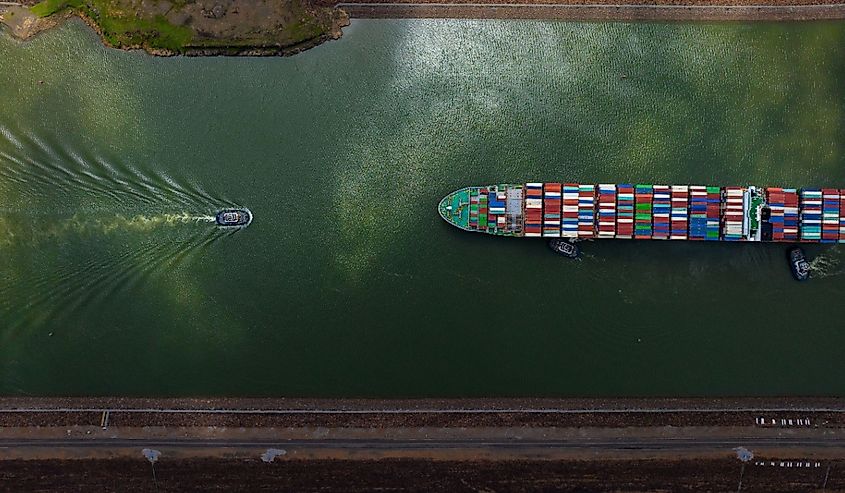 View of Canal and shipping containers on a large ship