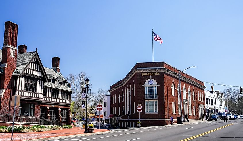 View from road one to Church Lane in beautiful spring day with Patagonia store and Anthropologie store, Westport, Connecticut.