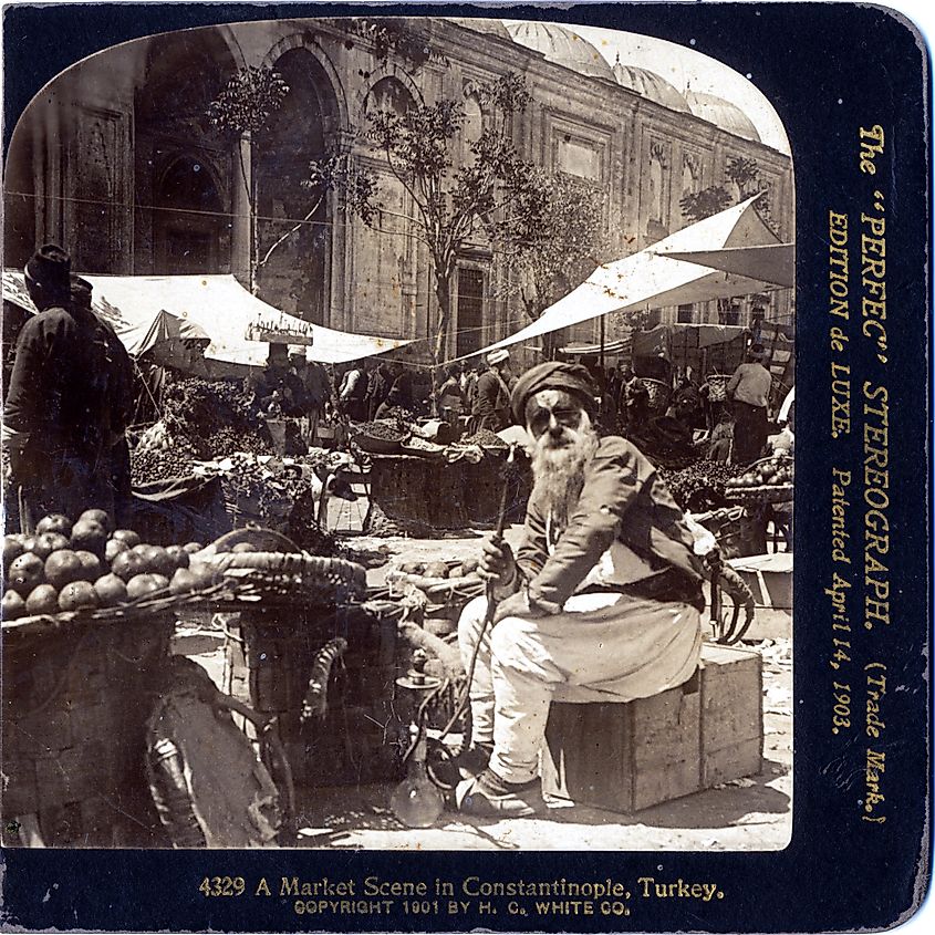 Market scene in Constantinople, Turkey, with vendors, stalls, and bustling crowds