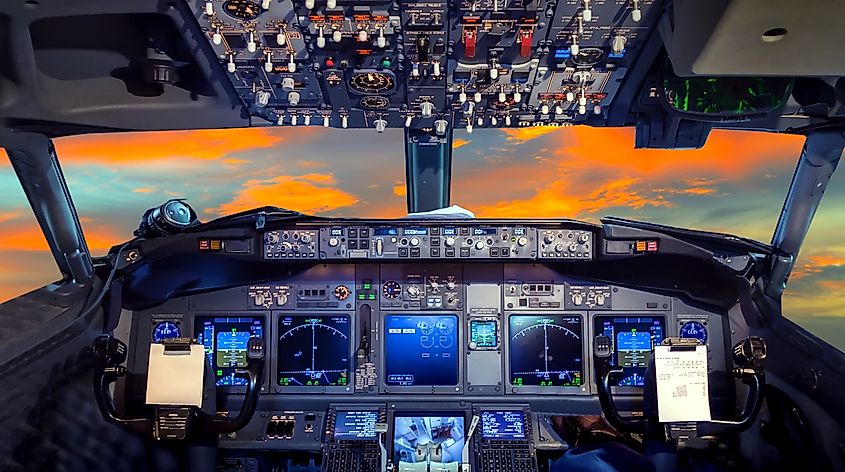 Airplane cockpit (Flight Deck) during sunset