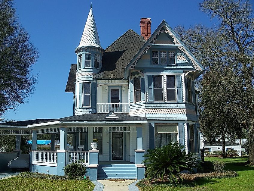 A house in the DeFuniak Springs Historic District in DeFuniak Springs, Florida. It is on Circle Drive, the road that goes around Lake DeFuniak, at the heart of the district.