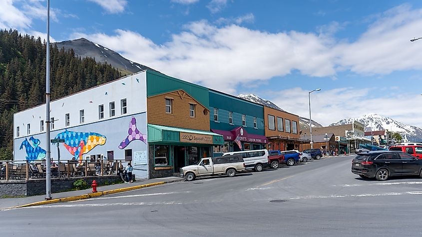 Downtown Seward with Mount Marathon, site of Mount Marathon Race run annually on July 4th. 4th Avenue, "Whale Redux" Mural by Jay Leslie, restaurants and shopping.
