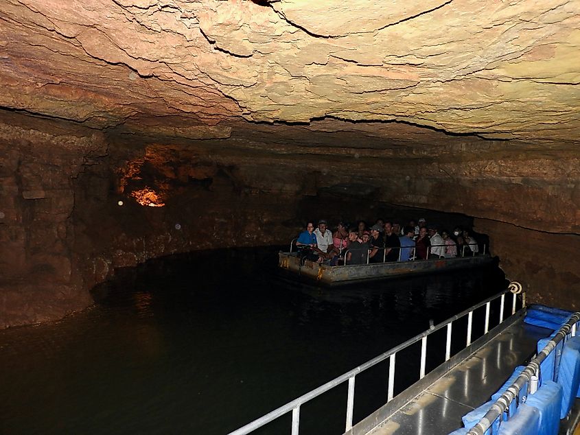 A boat goes down the underground river at Indiana Caverns outside of Corydon, Indiana.