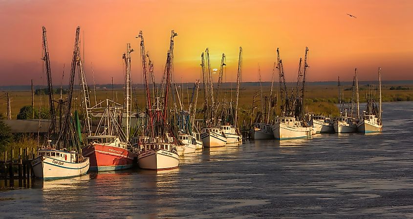 Shrimp boats tied up at a dock along the Butler River in Darien, Georgia