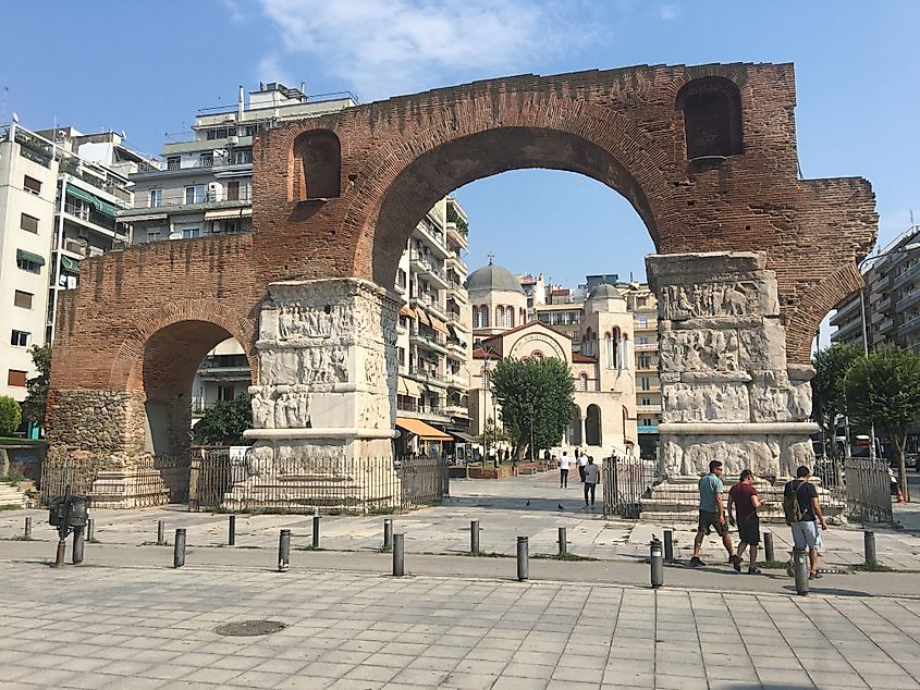 An ancient Greek stone gate stands in the middle of the modern metropolis, Thessaloniki.