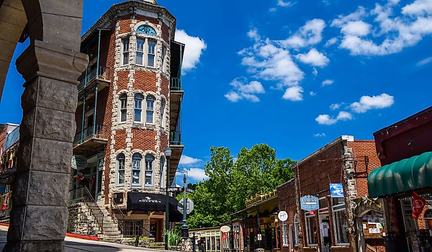 Historic downtown Eureka Springs, AR, with boutique shops and famous buildings.