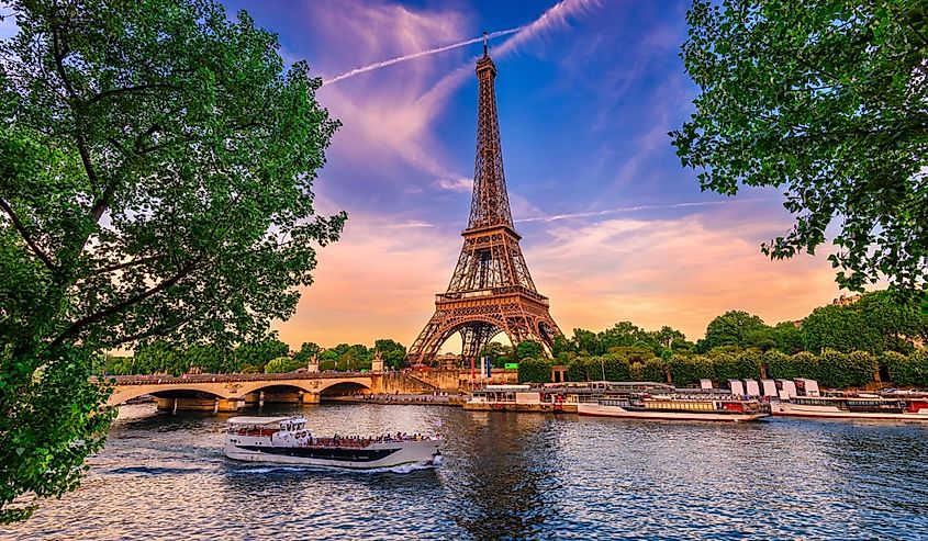 Paris Eiffel Tower and river Seine at sunset in Paris, France.