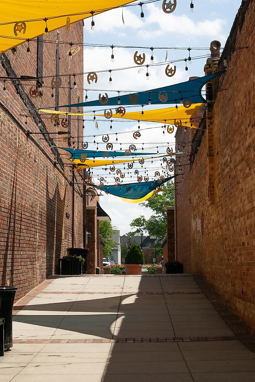 Walkway with banner decorations with stars and horseshoes in Camden, South Carolina.