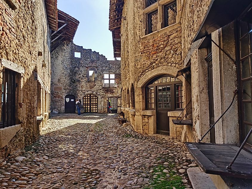 Cobblestone street in the medieval city of Pérouges, France.