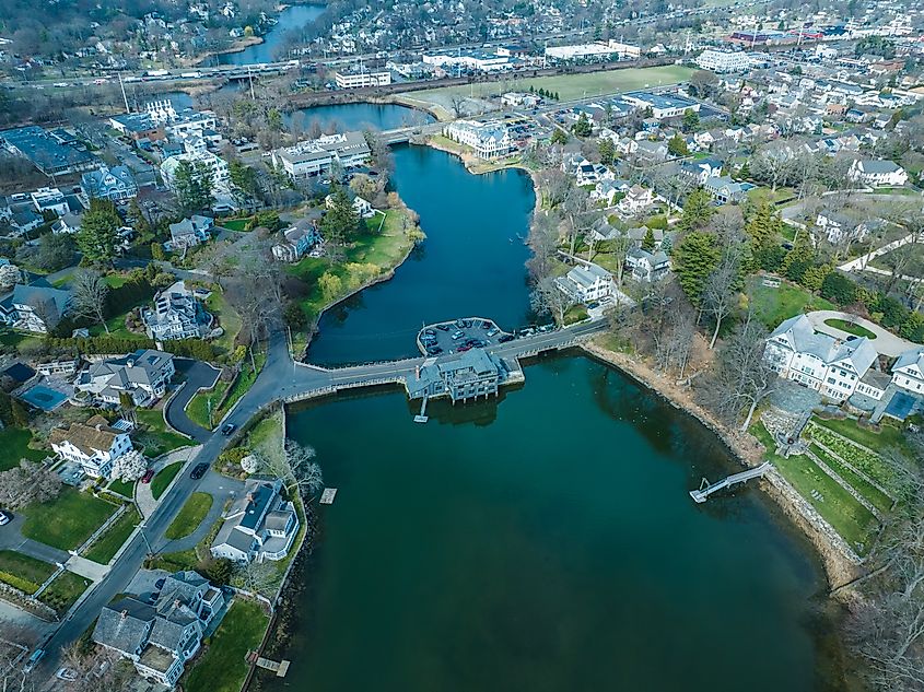 Aerial view of Southport, Connecticut, showcasing its coastal charm with marinas, historic homes, and lush greenery along the Long Island Sound.