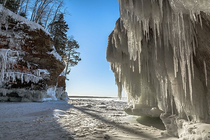 Icicle and snow-laden shoreline sandstone formations on Wisconsin's Apostle Islands National Lakeshore near Meyer's beach; Lake Superior. 