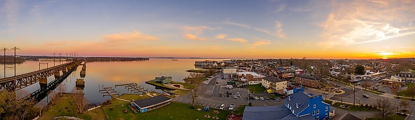 Aerial sunset panorama of Havre De Grace, Harford County, Maryland, featuring the railroad bridge over the mouth of the Susquehanna River and the head of Chesapeake Bay. One of America's best small towns.