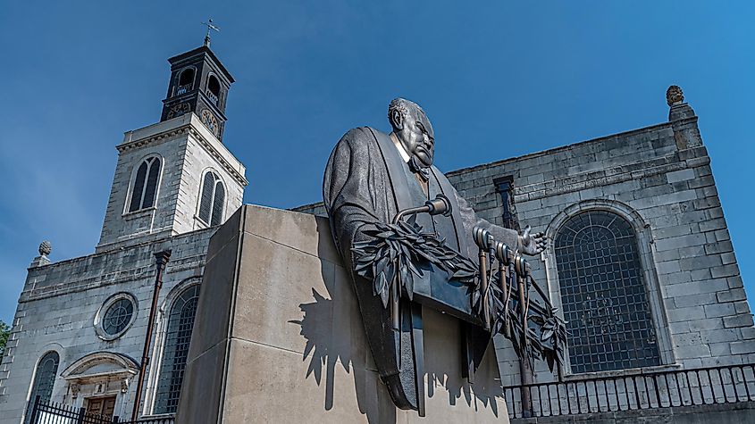 Bronze statue by Don Weigand stands in front of church at Westminster College