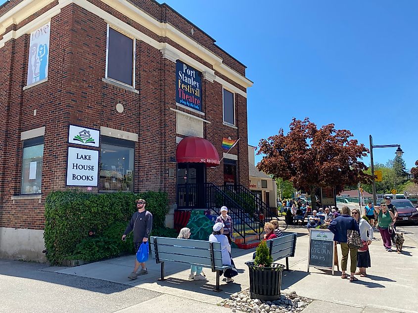 The sunny and populated exterior of the Port Stanley Festival Theatre, also shared by Lake House Books.