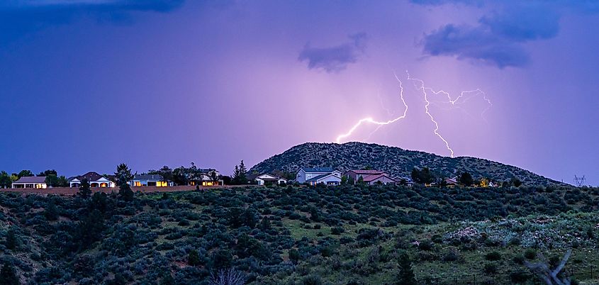 8 Best Small Towns To Retire In Arizona In 2024 WorldAtlas   Lightning Striking Above Houses 