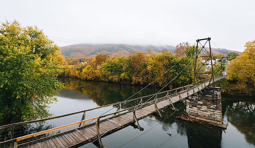 Swinging pedestrian bridge over the James River in Buchanan, Virginia. Image credit Jon Bilous via Shutterstock.