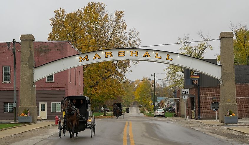 Horse-drawn Amish buggy under the Arch in downtown Marshall, Indiana.