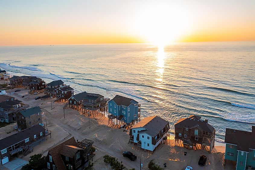 Buxton North Carolina - May 30 2022: Aerial view of homes and the ocean during sunrise in Buxton North Carolina Outer Banks