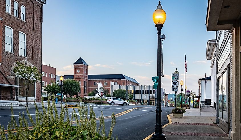 A car is turning on the roundabout around downtown fountain in a square in Somerset, Kentucky