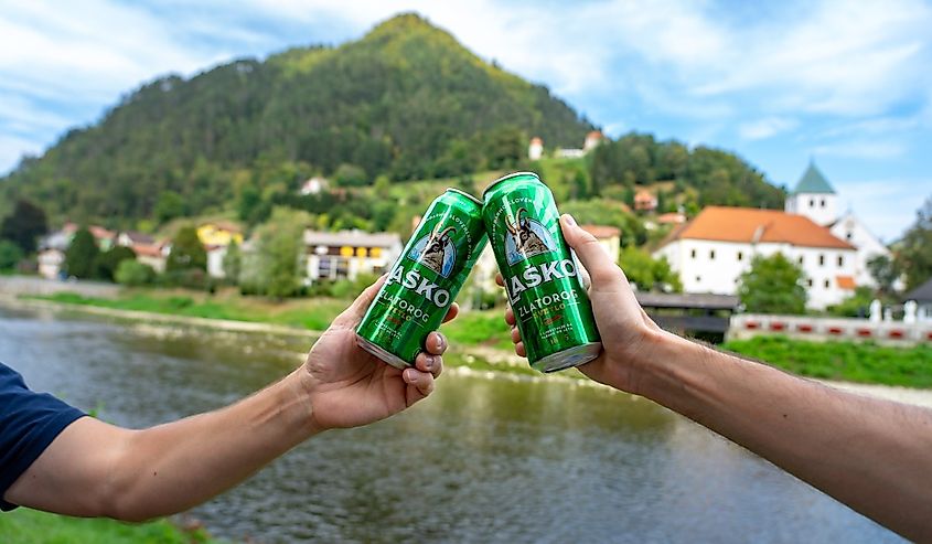 Cheers Toast with Lasko canned beer in Lasko, Slovenia.
