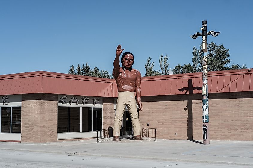 Tall 24-foot fiberglass statue of a Native American in front of the Chieftain Motel and Cafe along State Highway 281 in Carrington, North Dakota.