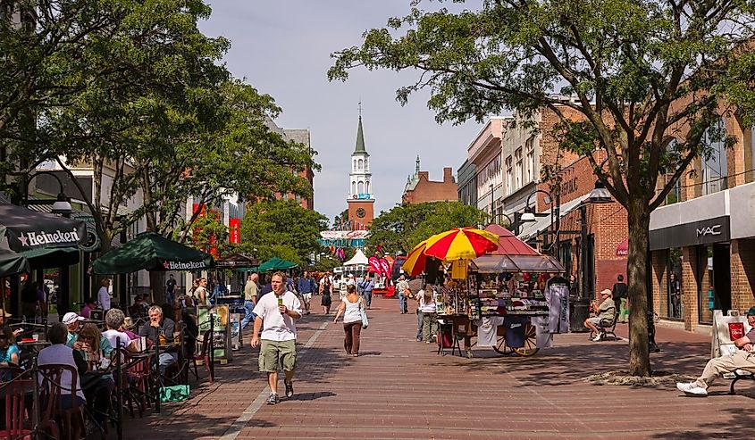 People on Church Street, a pedestrian mall with sidewalk cafes and restaurants in Burlington, Vermont.