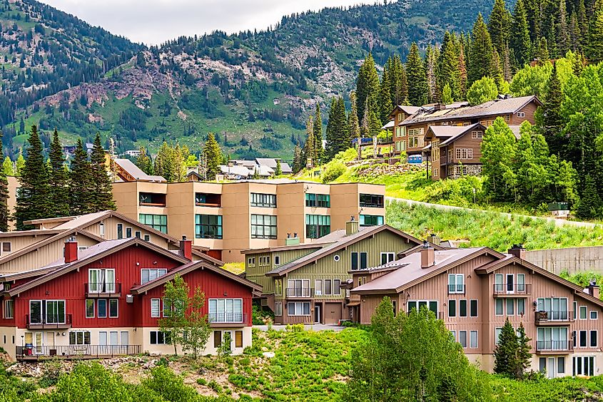 Cityscape view of small ski resort town village from Albion Basin, Utah in summer and Little Cottonwood Canyon. 