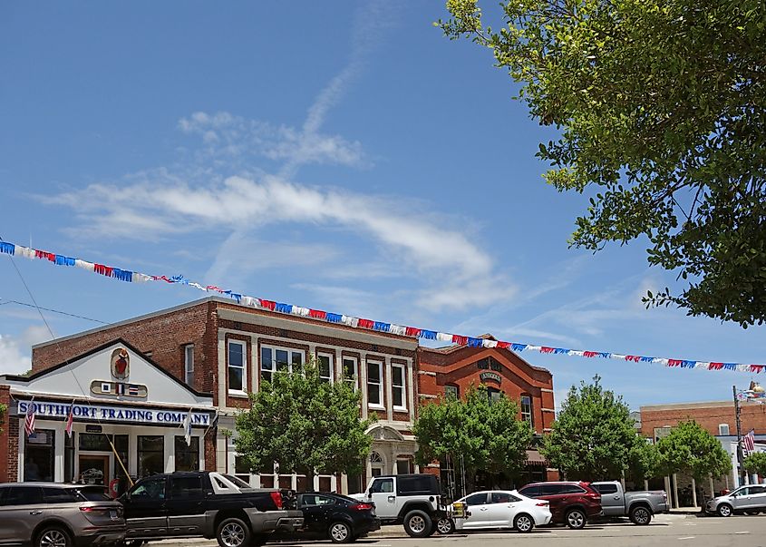 Storefronts in downtown Southport, with a mix of unique retail shops and restaurants. Editorial credit: zimmytws / Shutterstock.com