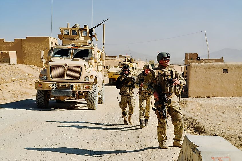 A Polish unit patrolling around Afghanistan 2010. Credit Shutterstock: Ryanzo W. Perez.