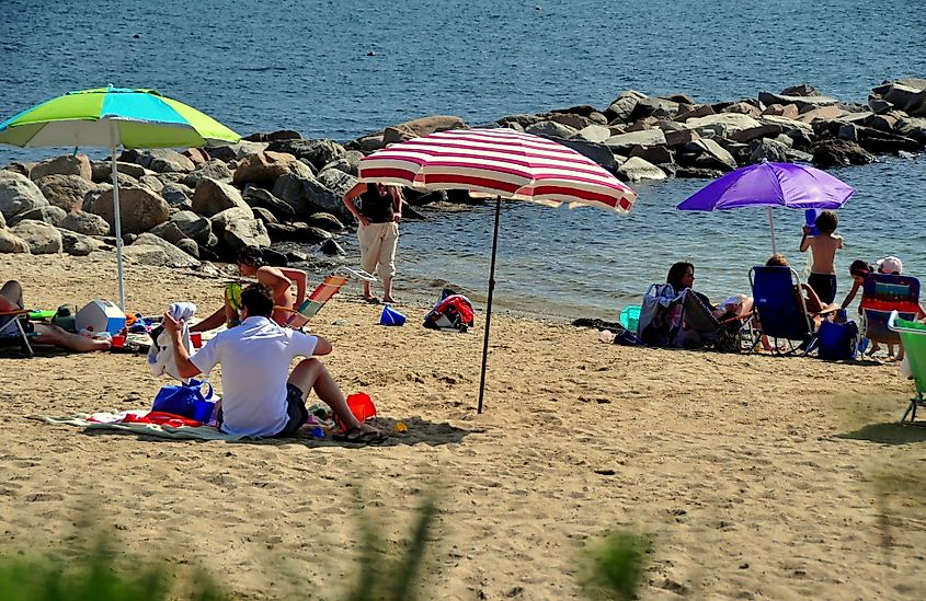 Visitors at duBois Beach in Stonington.