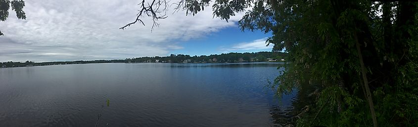 Panaroma view of Mascuppic Lake in Dracut, Massachusetts.. Editorial credit: Emily1 / Shutterstock.com