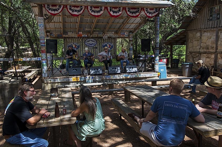 People attending a country music concert in Luckenbach, Texas, via TLF Images / Shutterstock.com