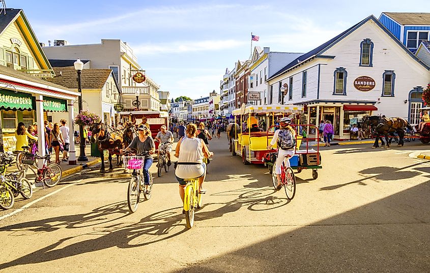 Vacationers take on Market Street on Mackinac Island. Editorial credit: Alexey Stiop / Shutterstock.com