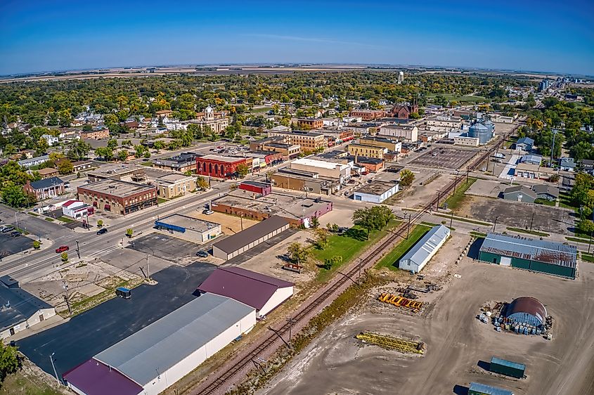 Aerial view of downtown Wahpeton, North Dakota, in summer, highlighting the small-town layout with tree-lined streets and local buildings.