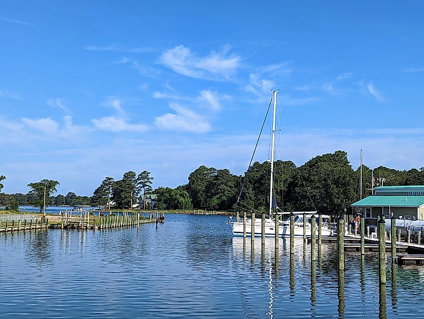 A sailboat gently rests in the marina at the center of Onancock, Virginia