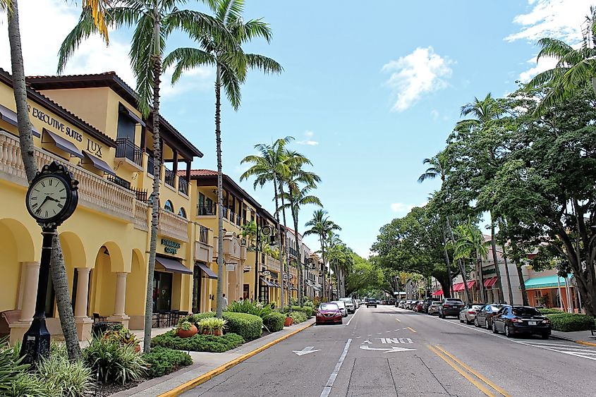 Luxury shops on 5th Avenue in Naples, Florida. Editorial credit: Jerome LABOUYRIE / Shutterstock.com.