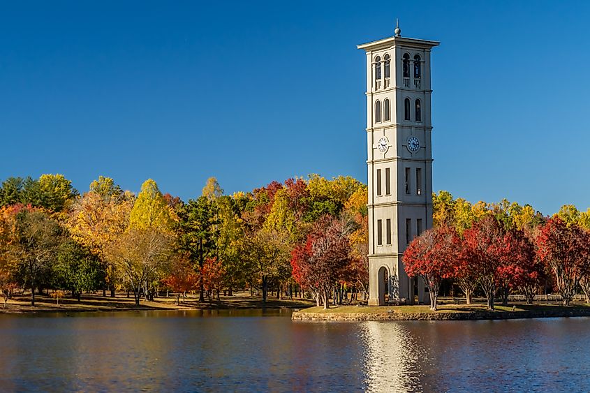 The Tower Clock at Furman University surrounded by vibrant autumn foliage