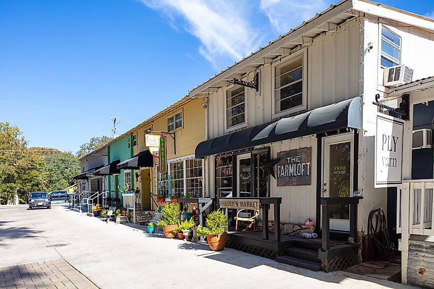 The small shops at Wimberley Square in Wimberley, Texas, showcasing a quaint and charming atmosphere.