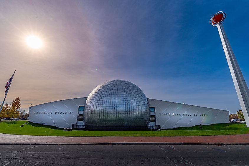 Outside view of Naismith Memorial Basketball Hall of Fame, an American history museum dedicated to Canadian-American physician James Naismith, who invented the sport. Editorial credit: RozenskiP / Shutterstock.com